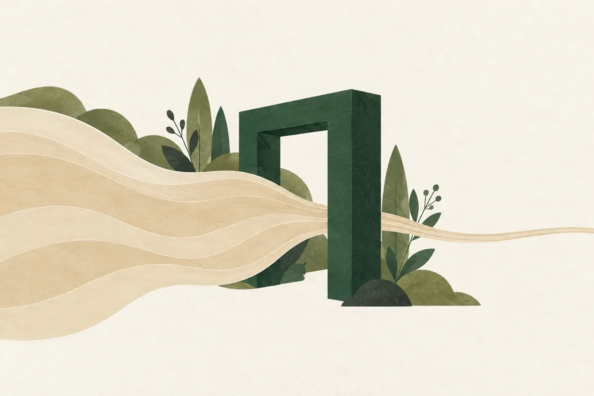 A broad sand-coloured stream passing through a green gate and continuing as a much thinner stream